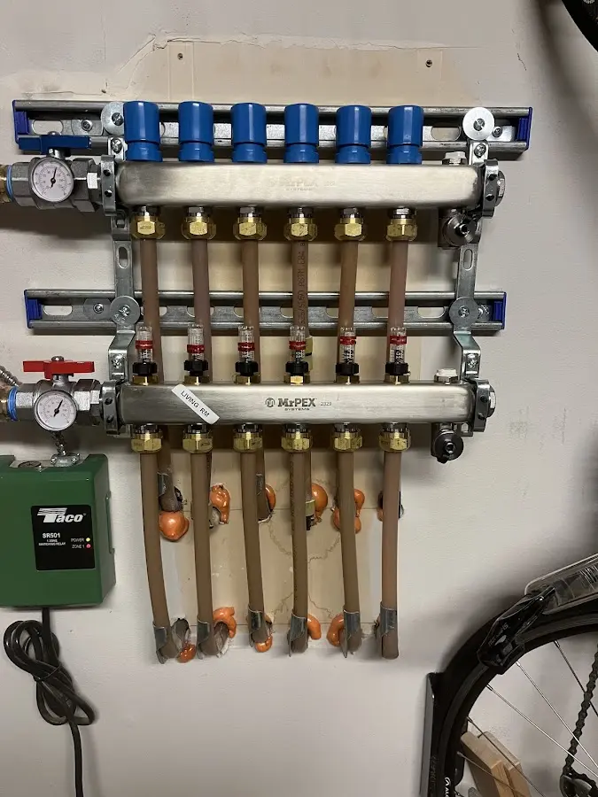 Plumber performing Gas Line Installation at a residential property in Oakfield